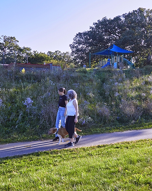 Residents walking on a community trail.