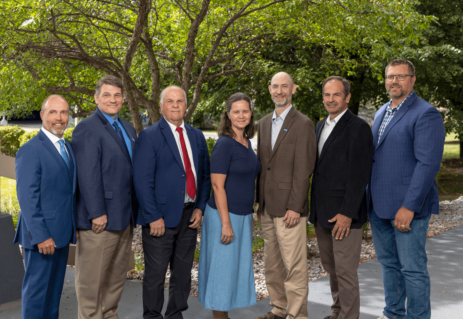 Group photo of Barr's Board of Directors taken outdoors