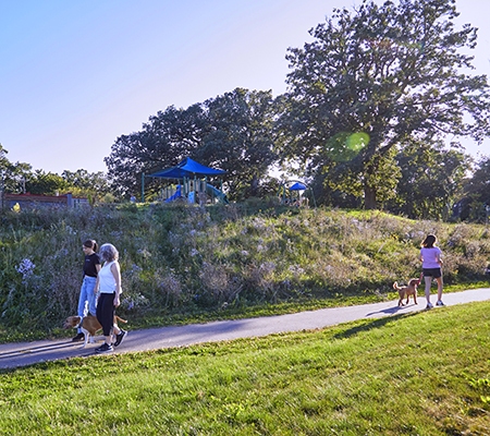 Residents walking on a community trail.