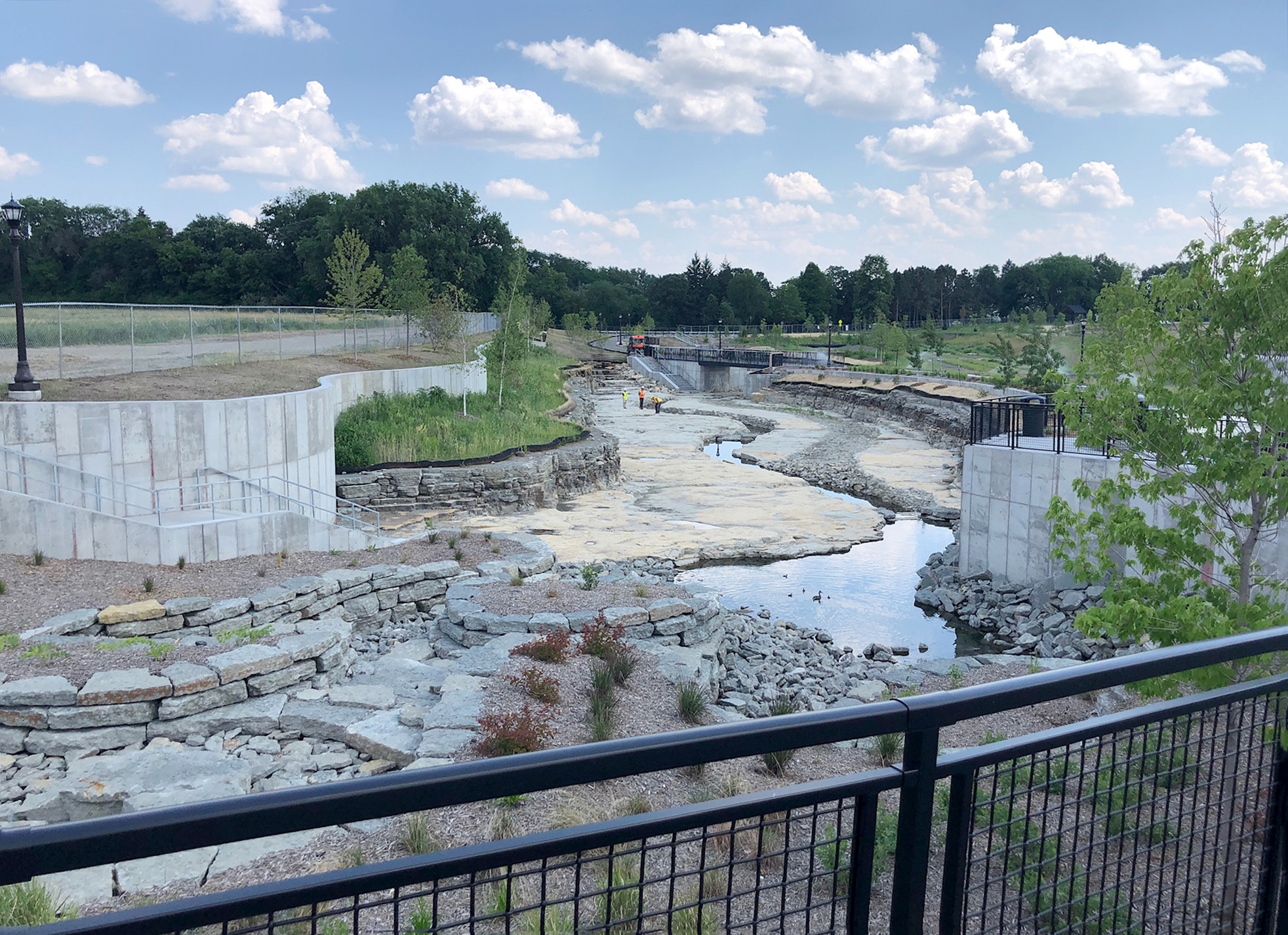 Stormwater moving through designed waterways at a city park
